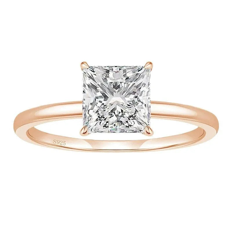 A geometric 925 silver women's ring with a round zirconium stone, shown in gold, rose gold, and silver finishes.