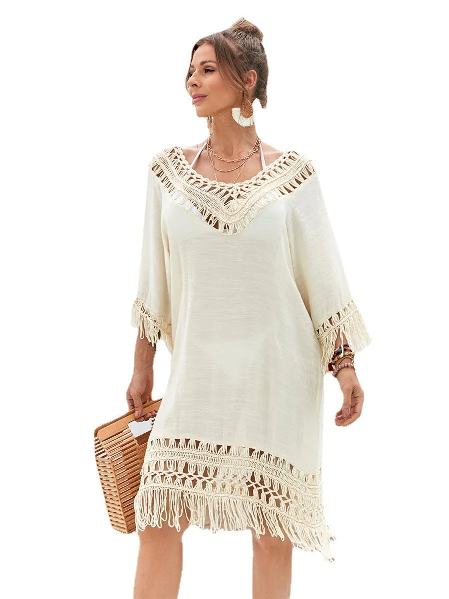 Apricot coloured women's long hand-crocheted beach dress with lining for swimming.