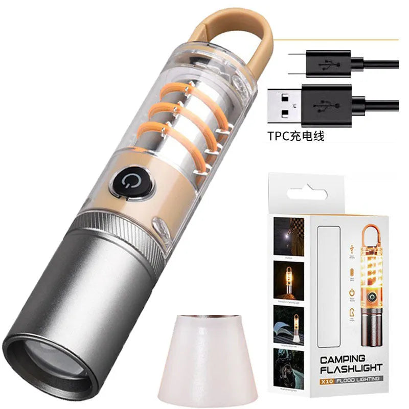 Orange and beige multifunctional flashlight with dual light source, hook attachment, and optical zoom feature