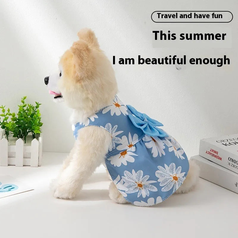 Ultra-thin floral butterfly knot pet dress for dog or cat with coloured bow, shown in blue.