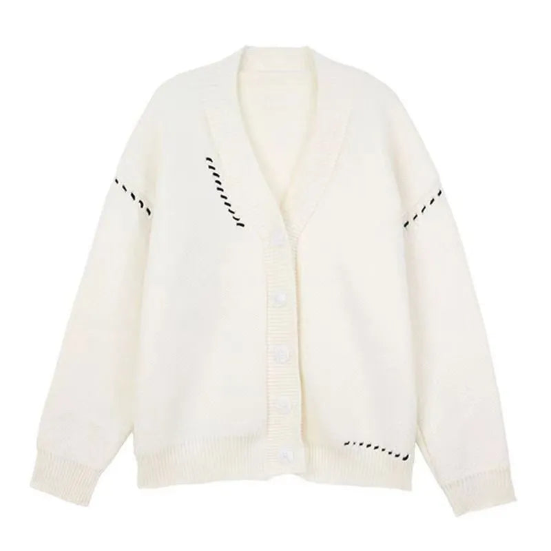 Women's long sleeve loose fit knitted cardigan coat in solid black or white colour.