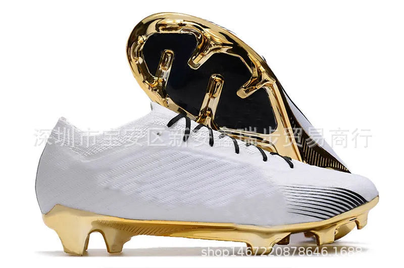 Men's black football shoes with knitted upper, lace-up closure, and rubber FG stud sole