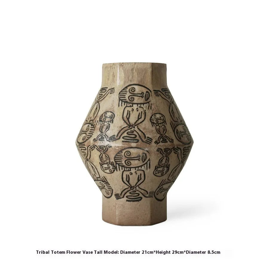 Ceramic vase with hand-painted vintage carved tribal totem art in religious symbolic patterns