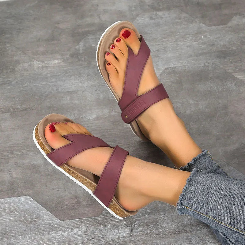 Flat toe ring flip-flops in blue with thick foam sole and artificial PU upper