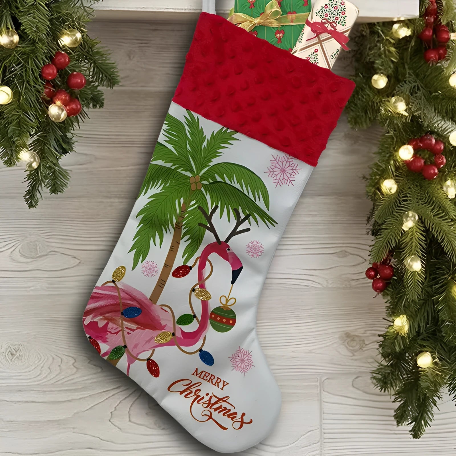 Flamingo pattern Christmas stocking decoration measuring 46 by 28 cm
