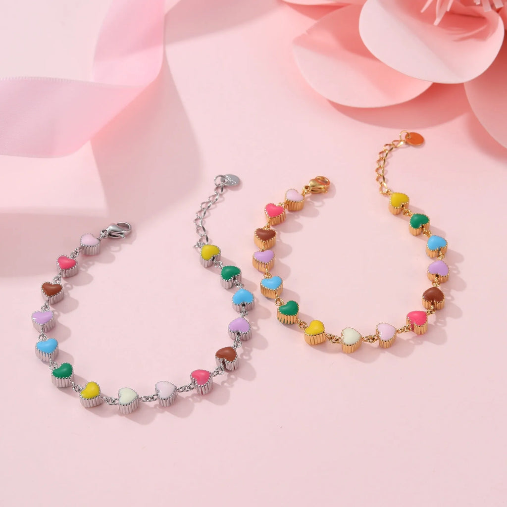 Women's stainless steel bracelet with heart pendant and colourful oil necklace elements