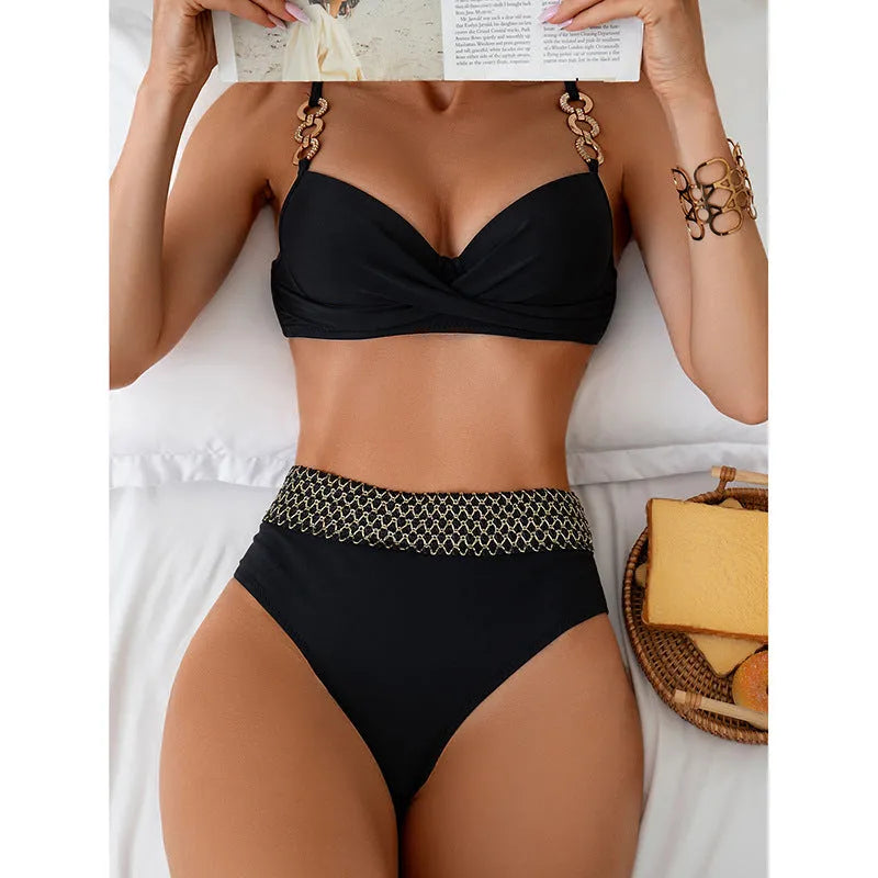 Black two-piece split bikini swimsuit on a mannequin, showing sleeveless top and briefs.