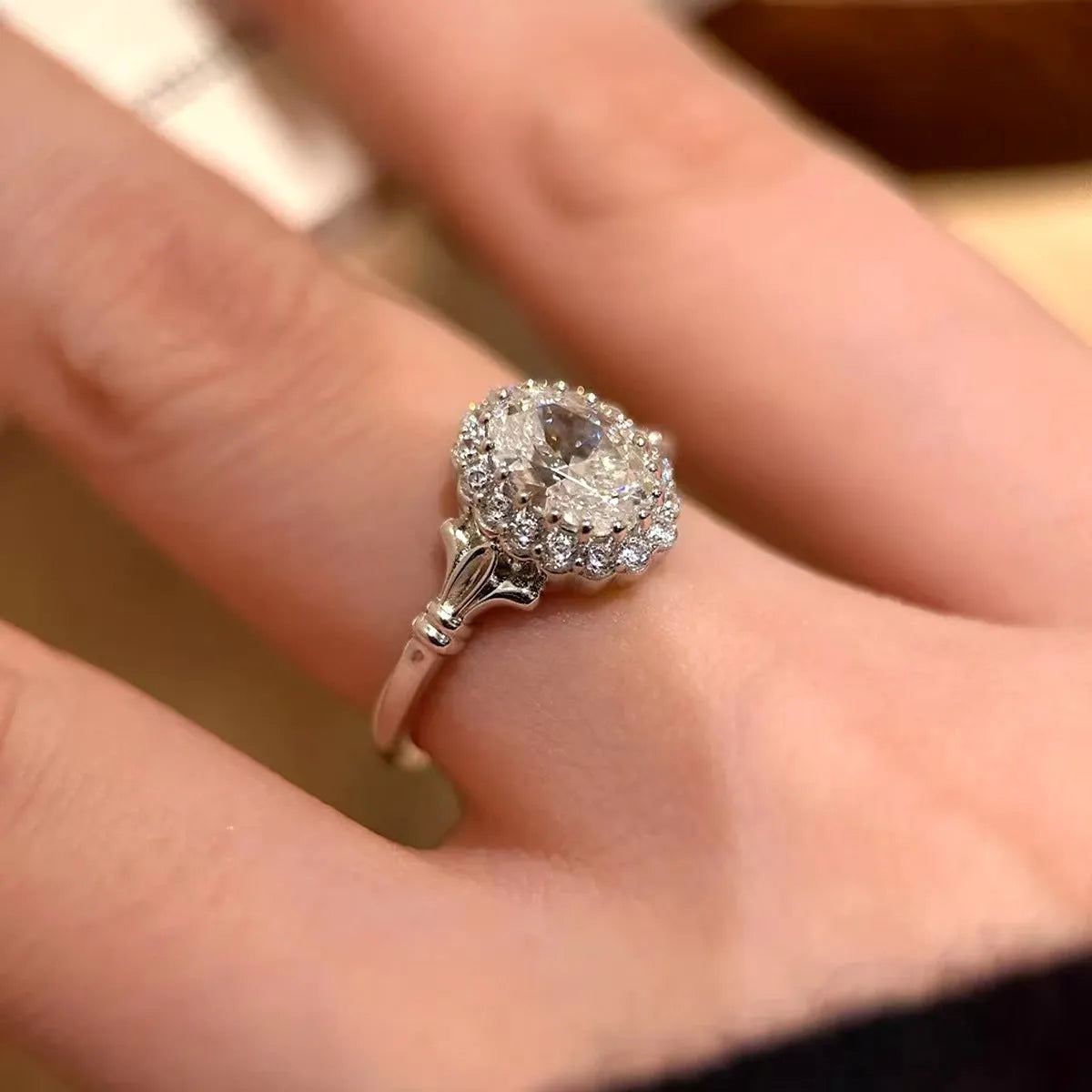 Silver geometric ring with bridal bouquet diamond design and adjustable opening