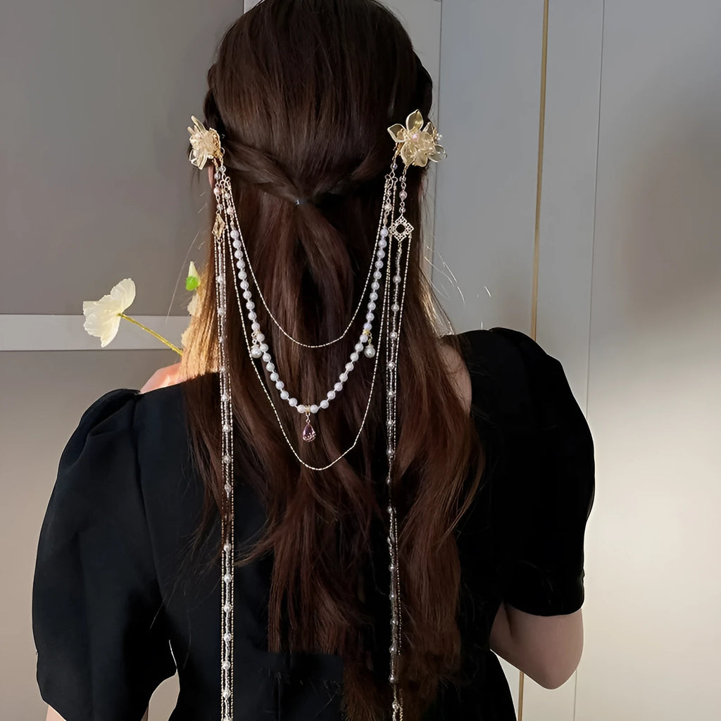 Gold women's hairpin with pearl, diamond flower and long tassel design