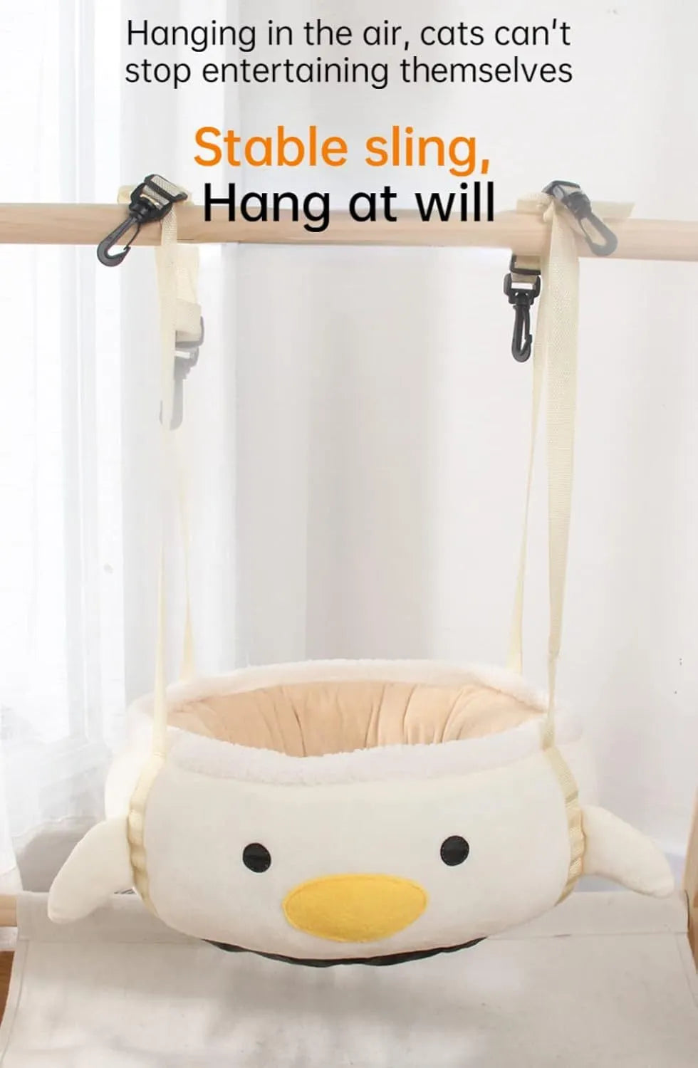 Green dinosaur and chick shaped cat bed that can be used flat or hung as a hammock