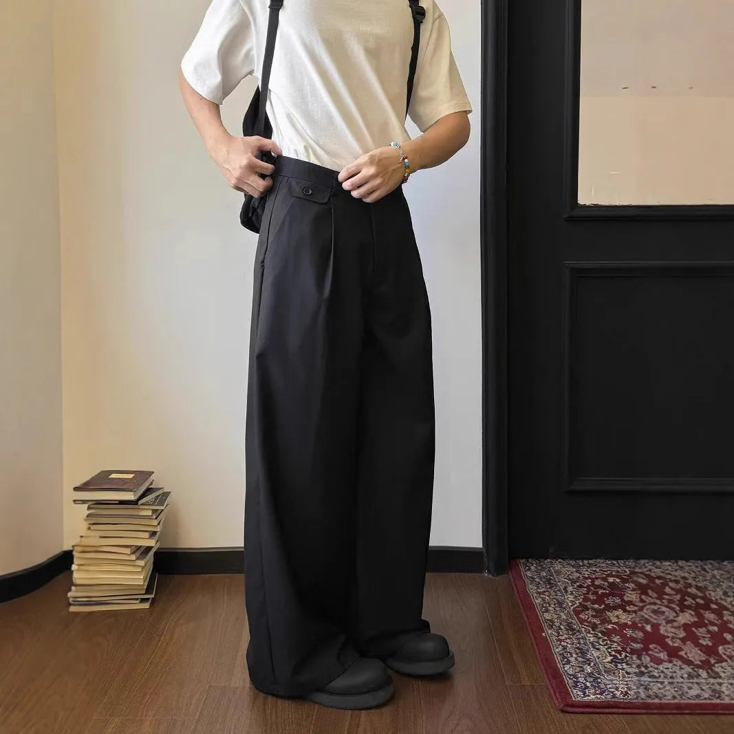 Man wearing brown straight-leg loose wide-leg casual suit pants made from polyester blend fabric