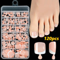 Open box showing 120 French style toe nail pieces with white tips in various nude colours.