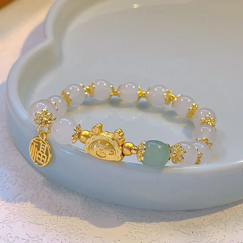 Women's glass glazed bracelet with floral and zodiac animal designs in red, pink and white colour options