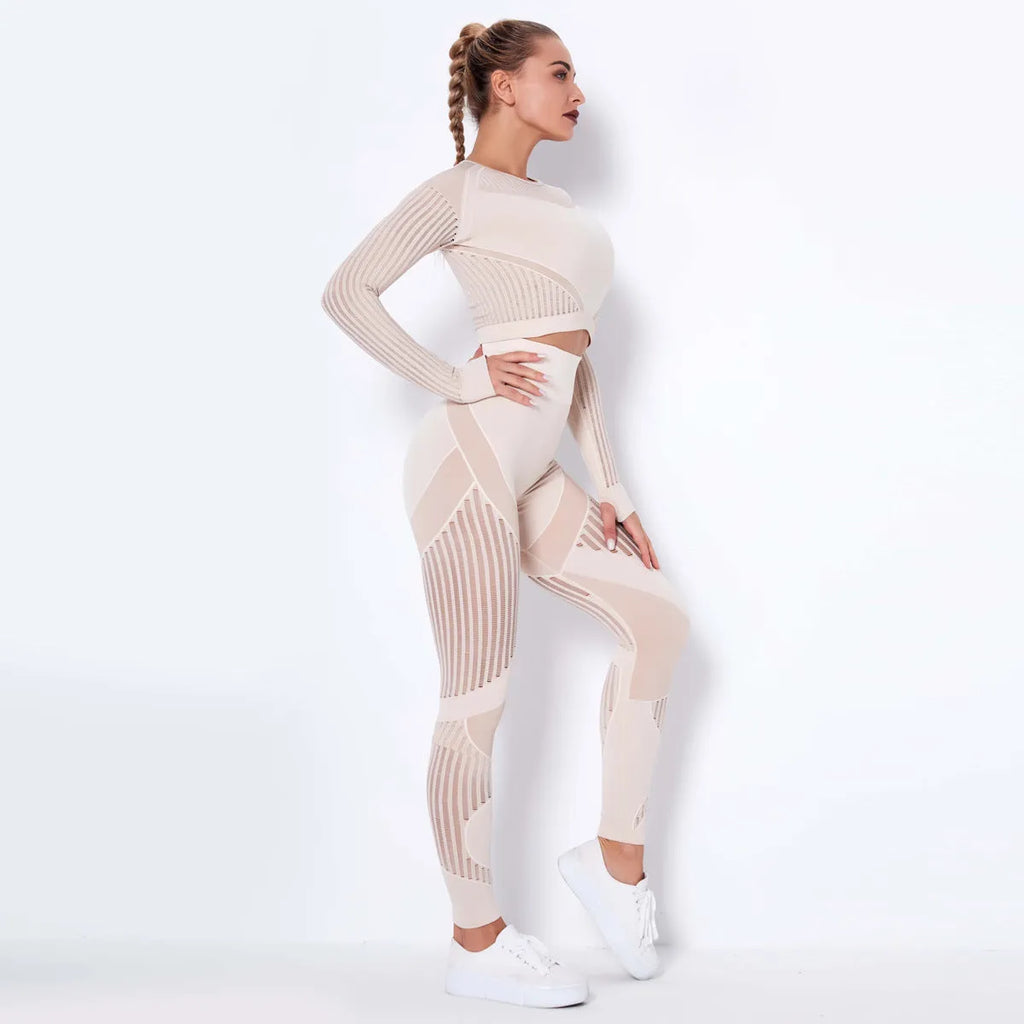 Women's long-sleeved seamless knitted yoga suit in a stripe pattern, shown in navy blue.