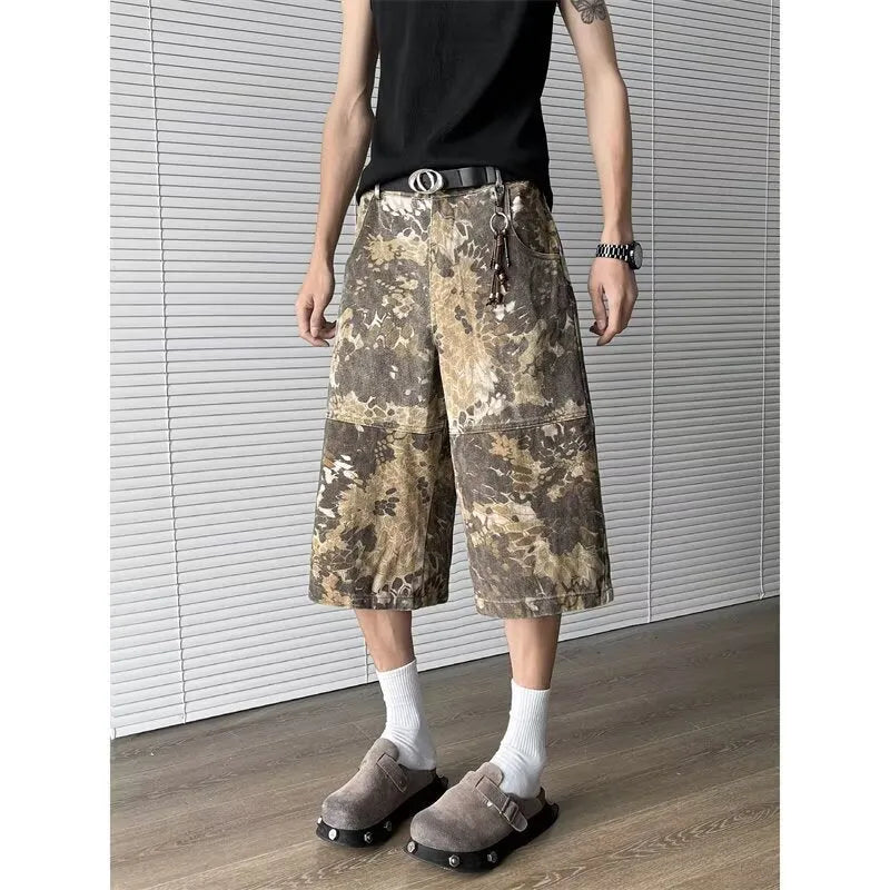 Yellow denim jeans with snake camouflage pattern, cropped length design