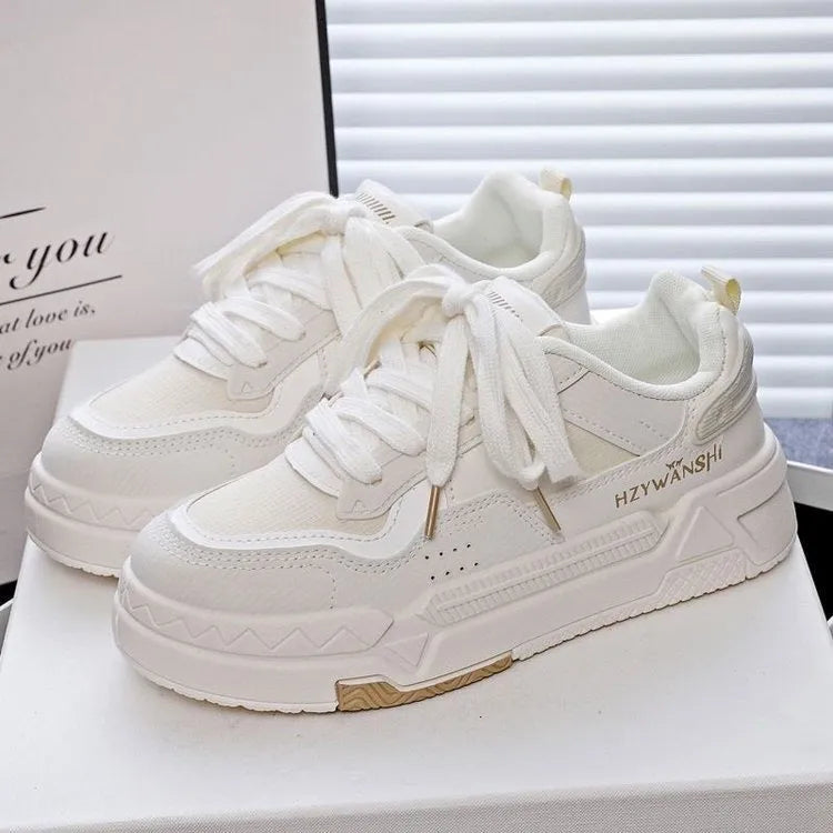 Children's platform sneakers with cross straps and thick rubber soles in beige colour