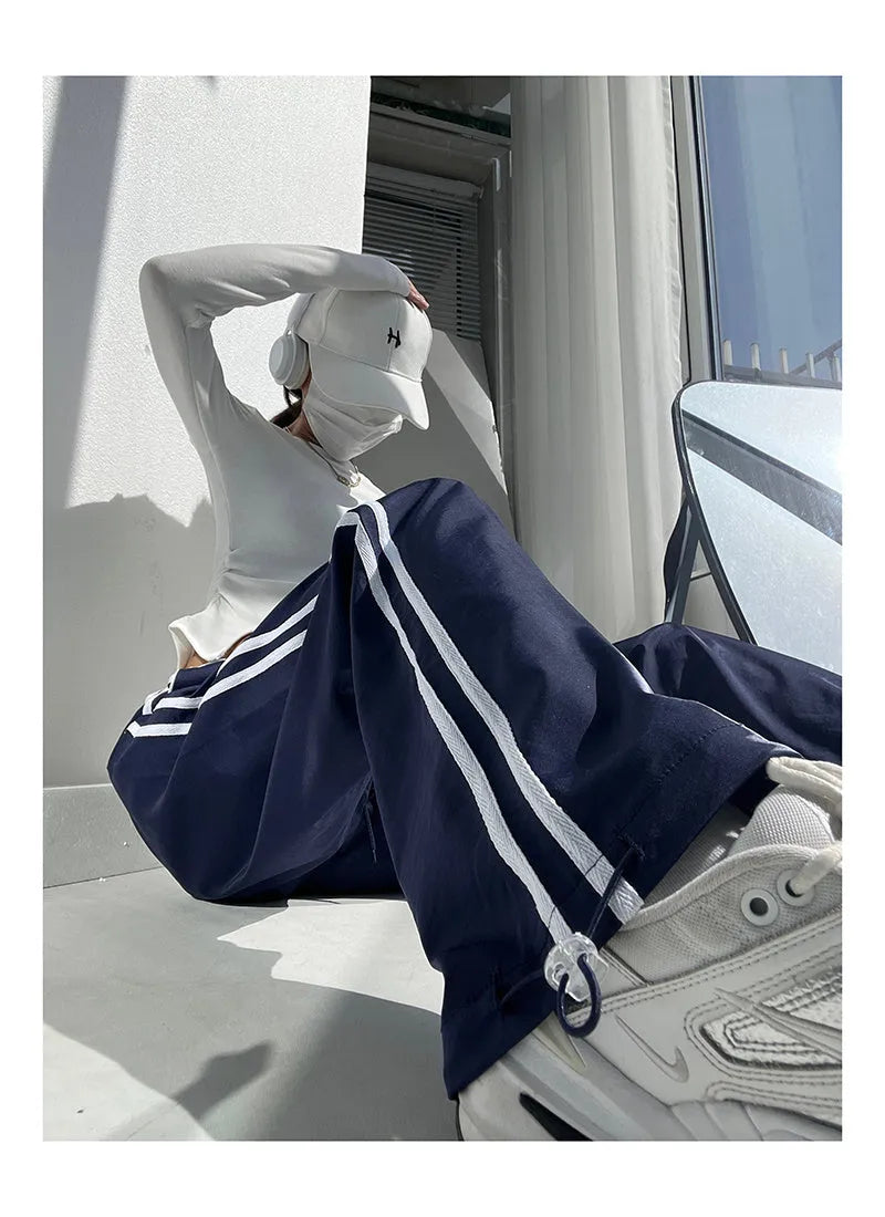 Ribbon parallel bars contrast colour loose straight slim draping trousers in thin fabric