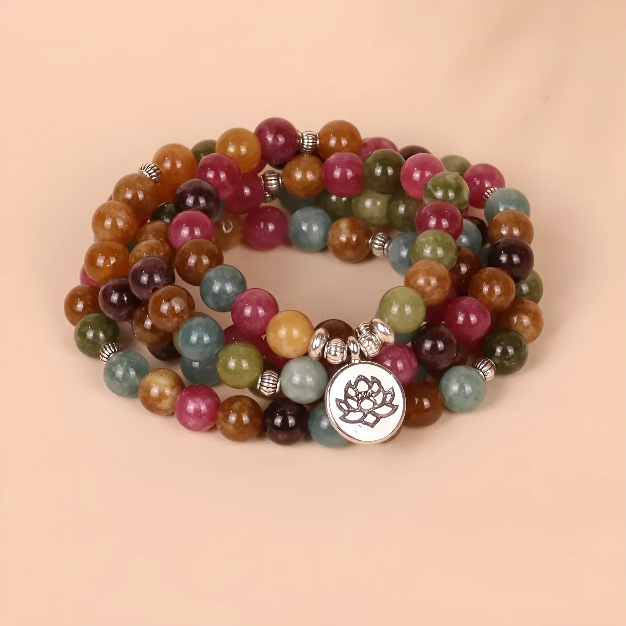 108-bead alloy bracelet with a multi-layer lotus charm in a natural tourmaline colour.