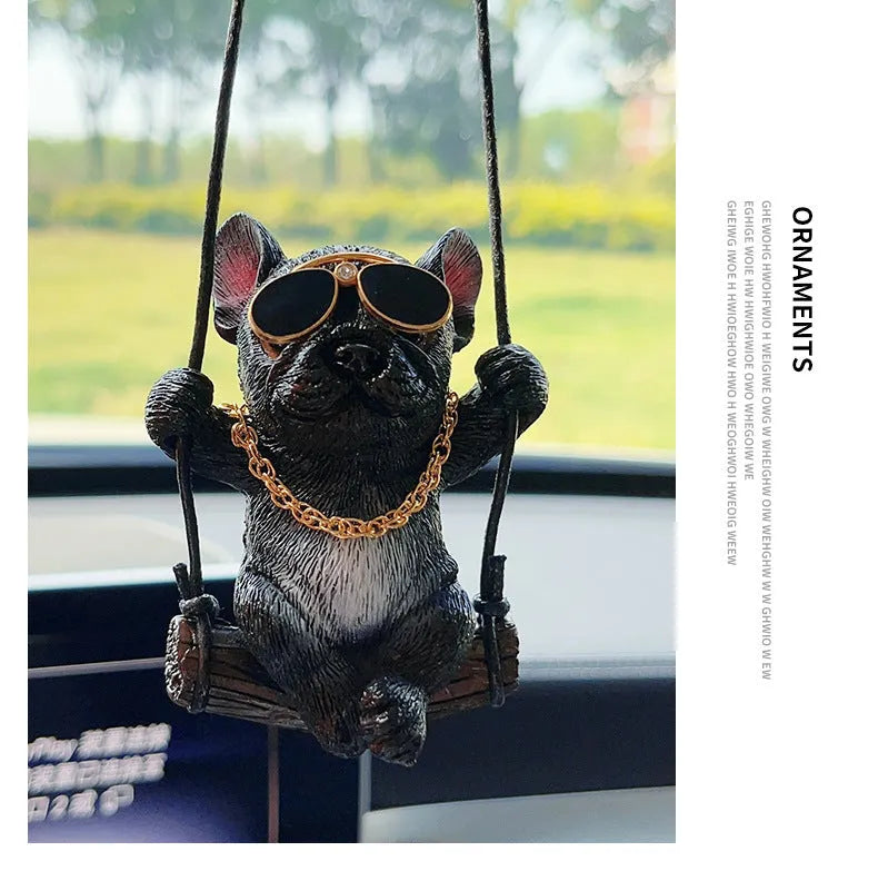 Resin cartoon bulldog car hanging ornament for a rearview mirror in various colours.
