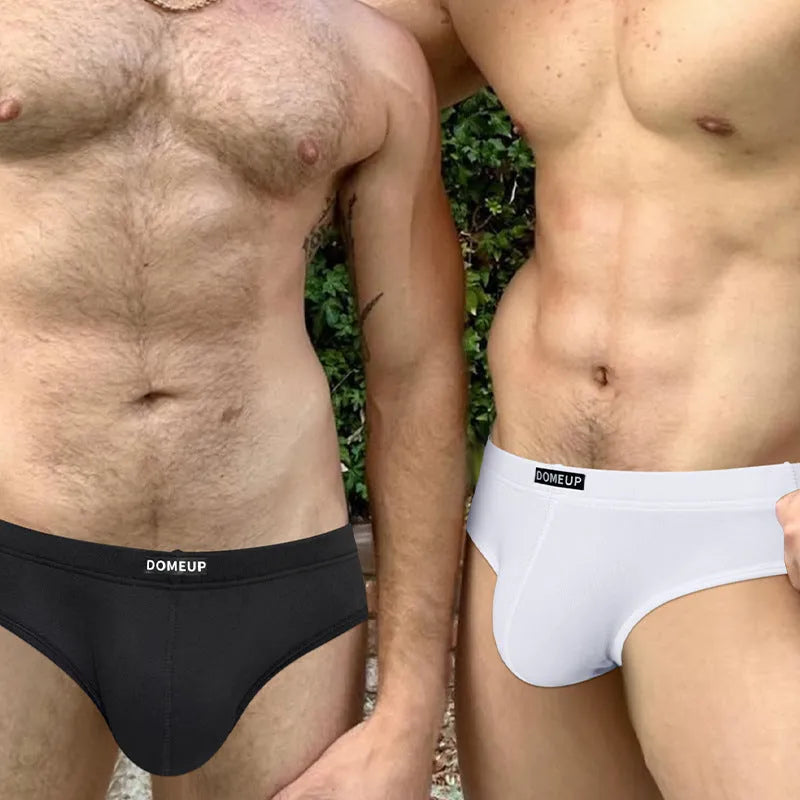 Men's low waist seamless briefs in black, white, and pink solid colours