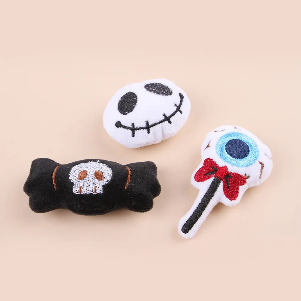 Small plush cat teaser toy with flexible handle in candy, eyes, or skull design
