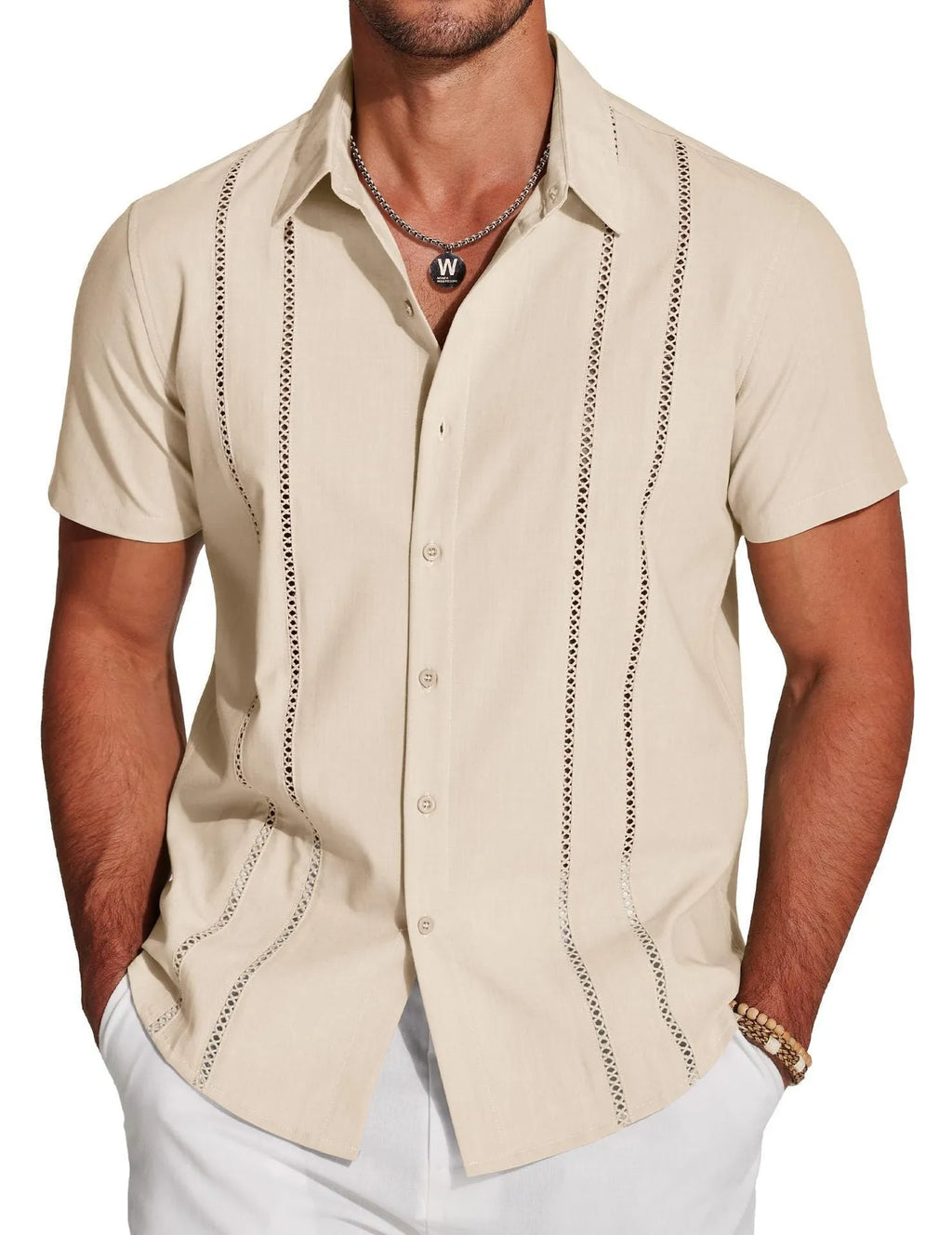 Man wearing a slim fit digital print Hawaiian short sleeve shirt in a casual setting