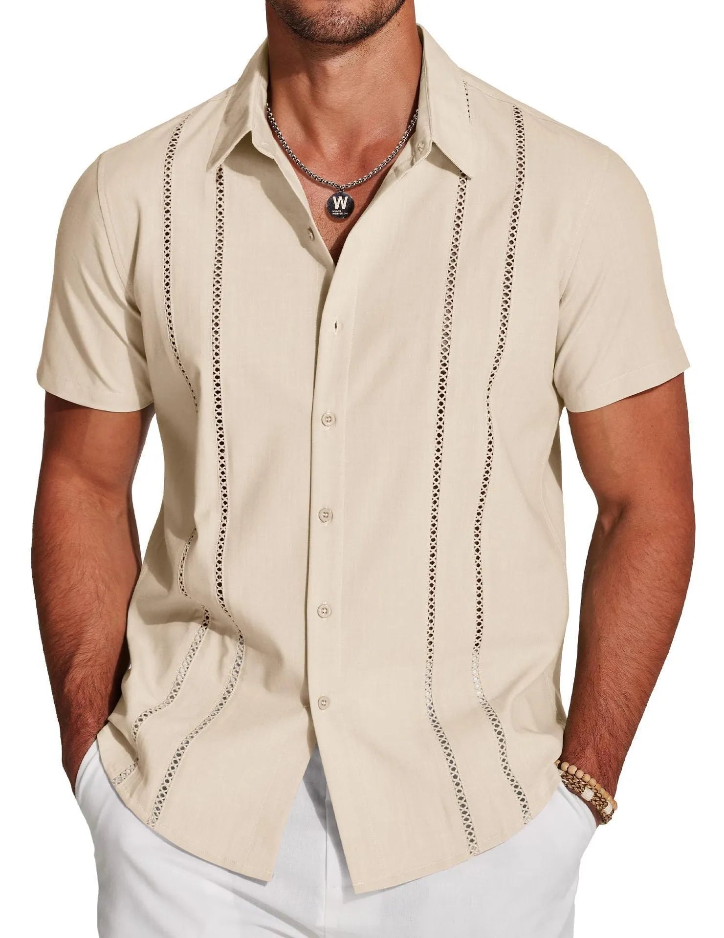 Man wearing a slim fit digital print Hawaiian short sleeve shirt in a casual setting