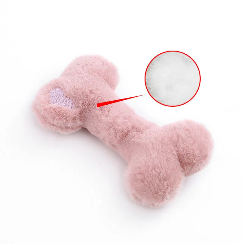 Blue love bone shaped plush dog toy with squeaker for biting and chewing.