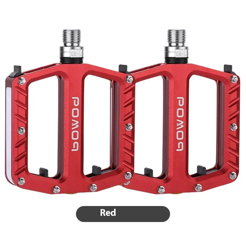 Pair of aluminium alloy bicycle pedals with integrated LED lights in a choice of colours.