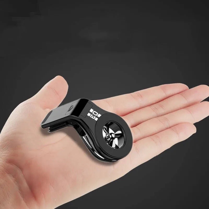 Black magnetic car air vent phone holder with adjustable angle and built-in perfume diffuser.