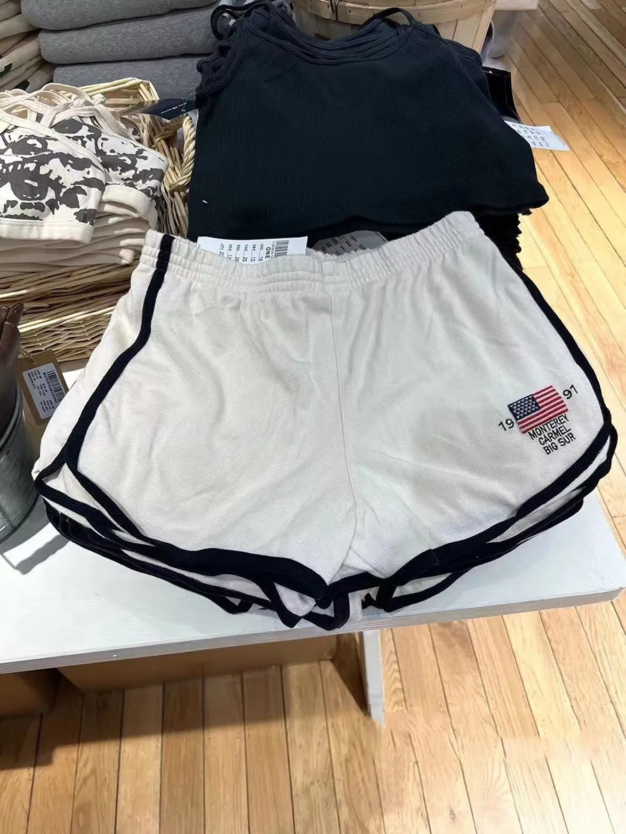 Women's dark blue cotton high top sports shorts with white flag embroidery