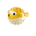 Fish-shaped interactive dog chew toy with treat dispenser in green, red or yellow colours