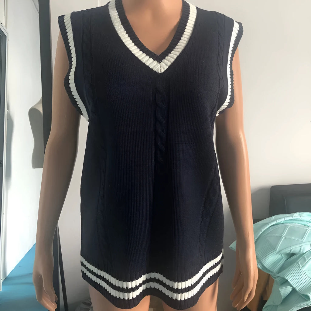 Women's slim fit V-neck knitted waistcoat with striped stitching in acrylic.