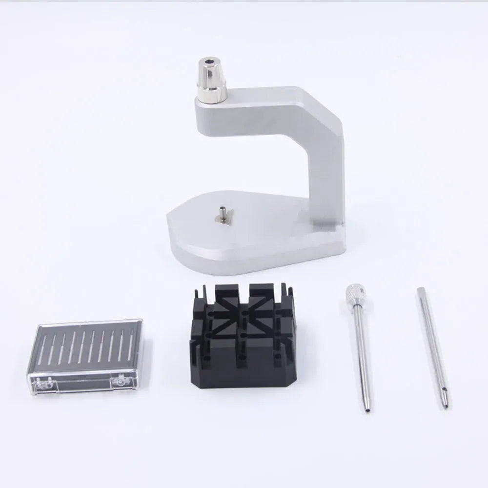 Silver tool steel press strap removal tool with 0.50-1.60mm blade specification on a work surface.