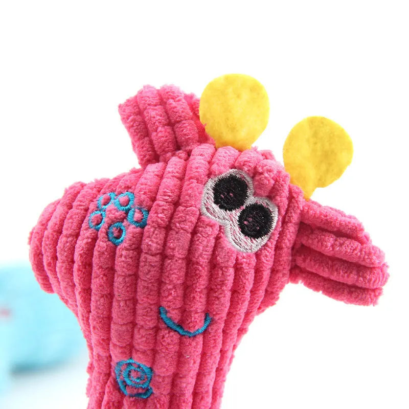 Blue deer-shaped plush dog toy with corn grain texture on a white background.