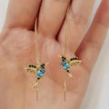 Long style bird hanging earrings with mixed zircon wings in red or blue electroplated alloy for women