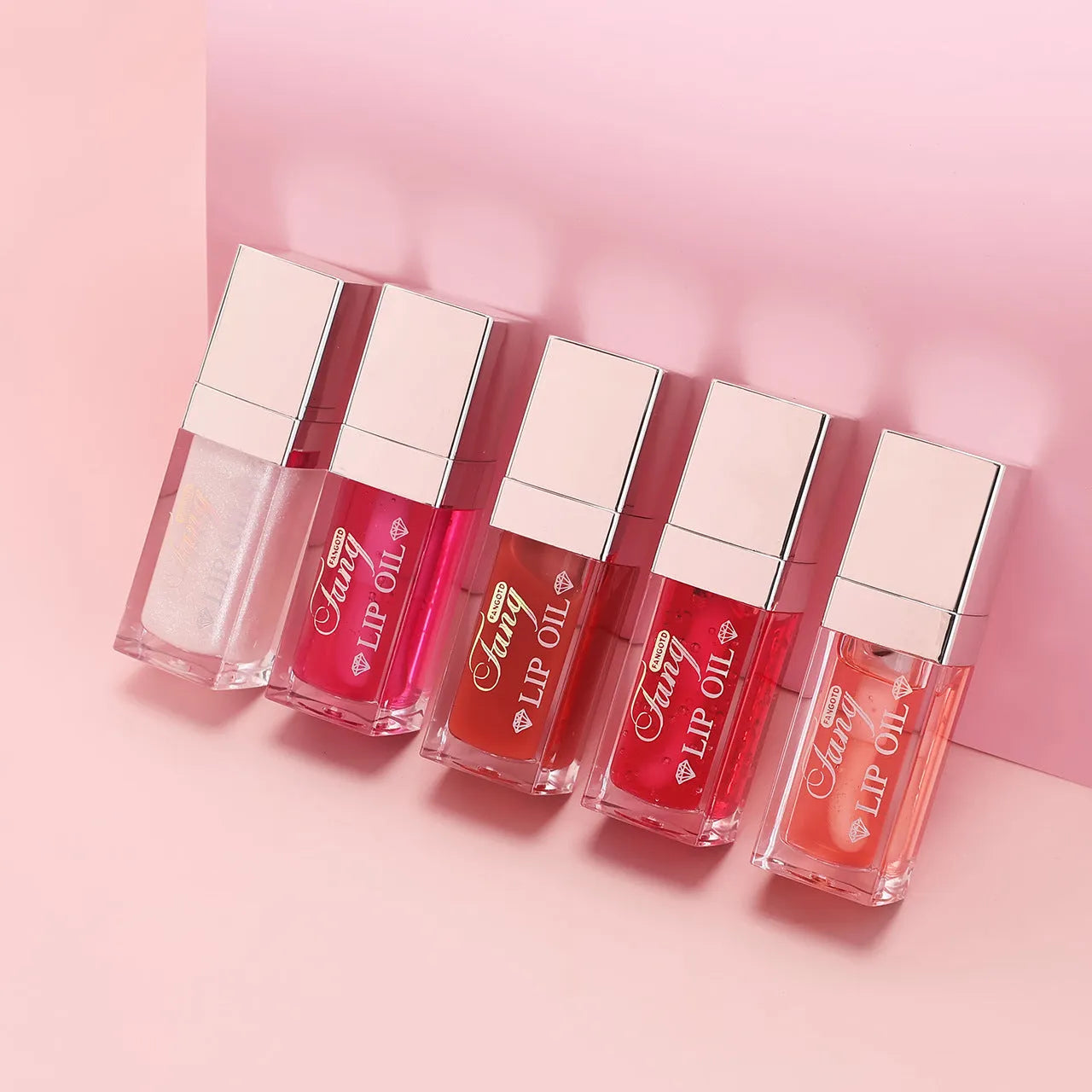 Five colourful tubes of mint-flavoured moisturising lip gloss with repairing formula