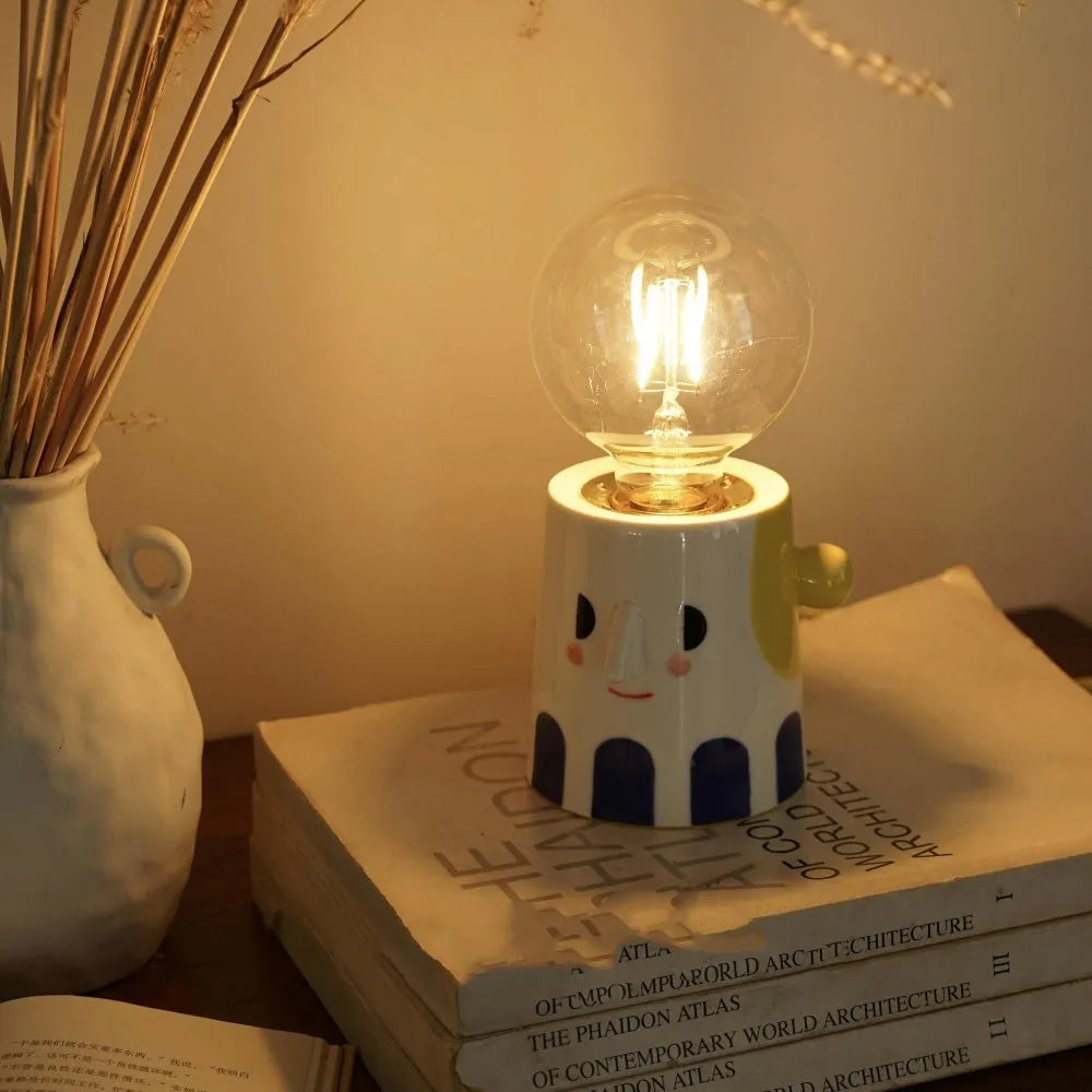 Handmade ceramic bedside lamp with ball headlight decorative design