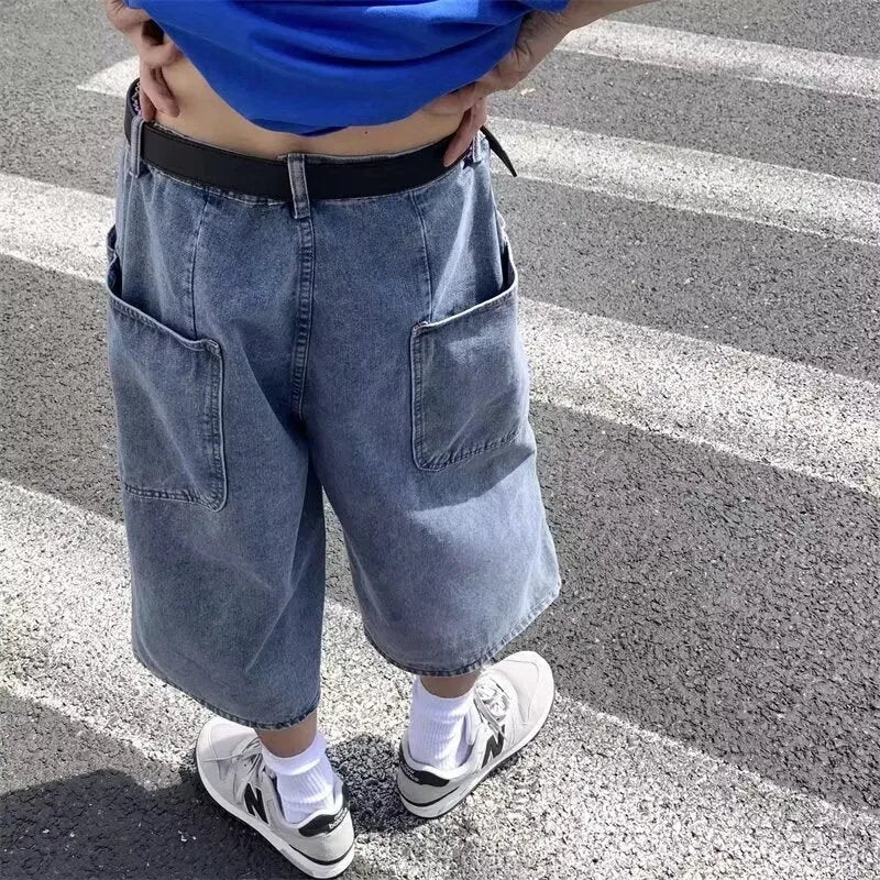 Men's blue washed denim pirate shorts with cropped length and high waist