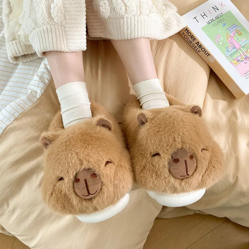 Light brown women's plush winter slippers with cartoon pattern, artificial wool lining and PVC soles