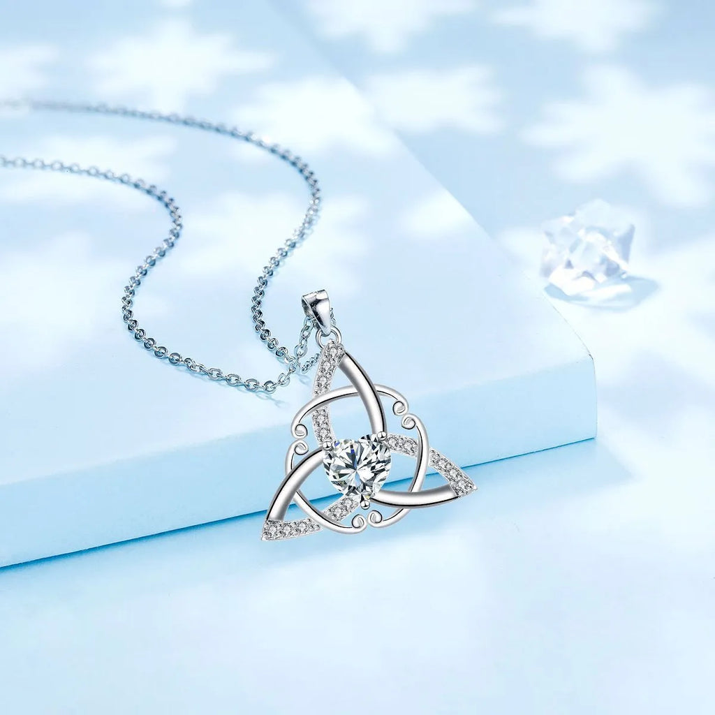 Women's geometric Celtic knot pendant necklace in copper with electroplated blue finish