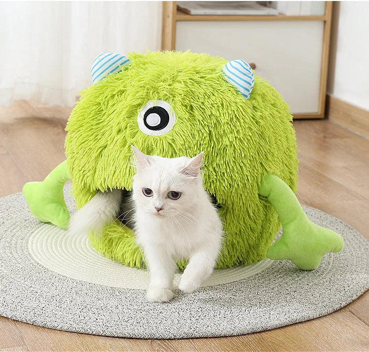 Round fluffy plush cat bed on floor with non-slip base, shown in three size options