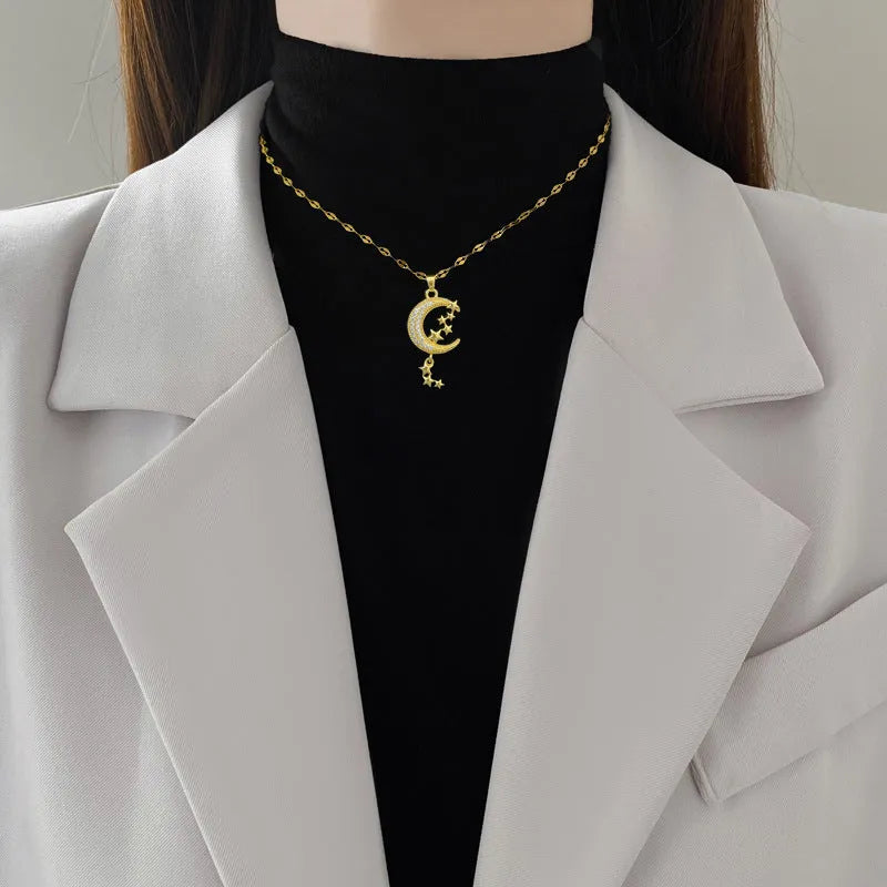 Moon tassel necklace with geometric chain and diamond decoration in stainless steel and copper