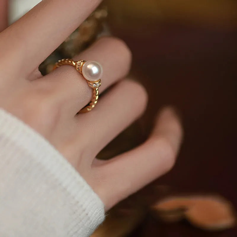 Antique twist pearl ring with adjustable copper band in geometric design with pearl inlay