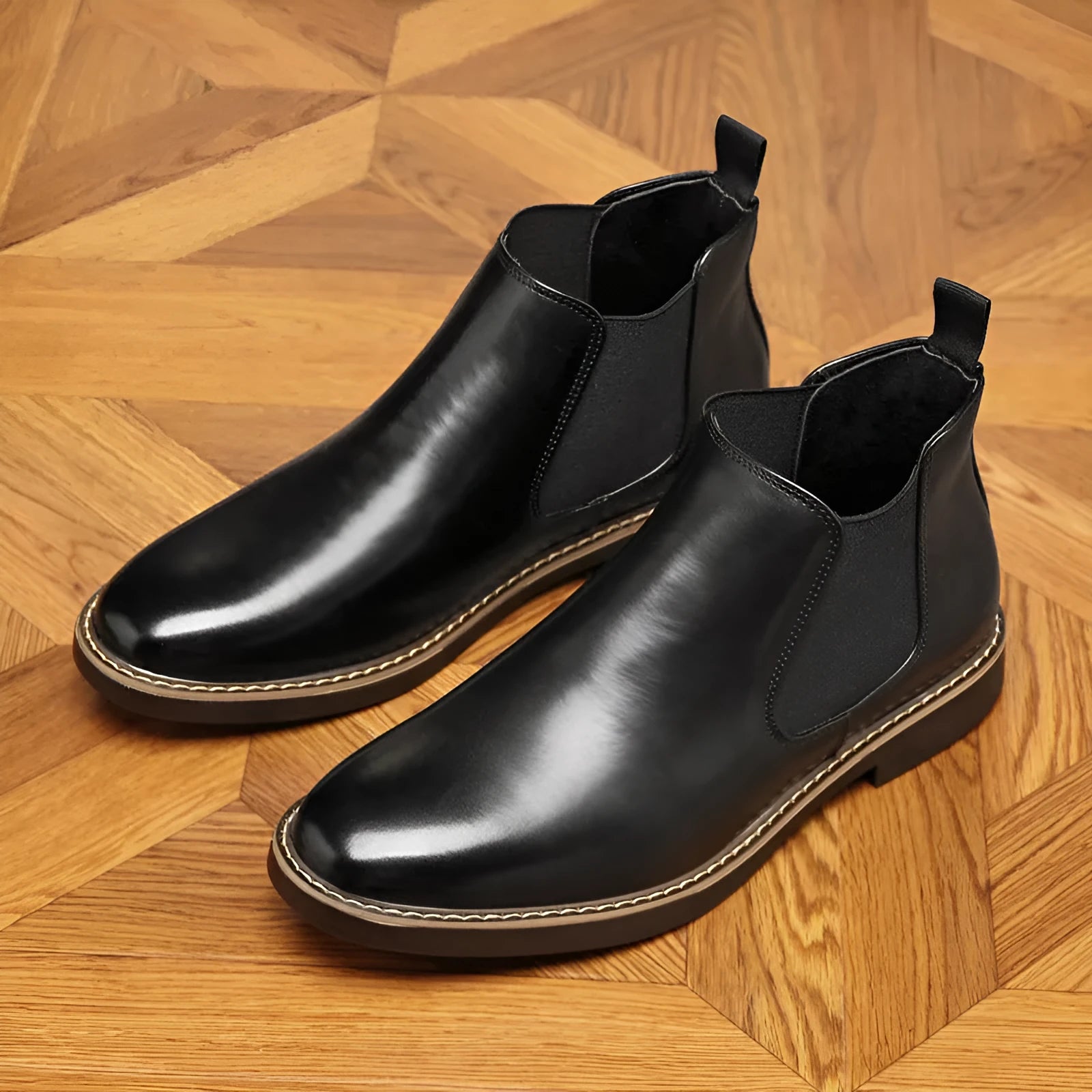 Men's black formal pointed-toe leather boots with a square rubber heel on a plain background