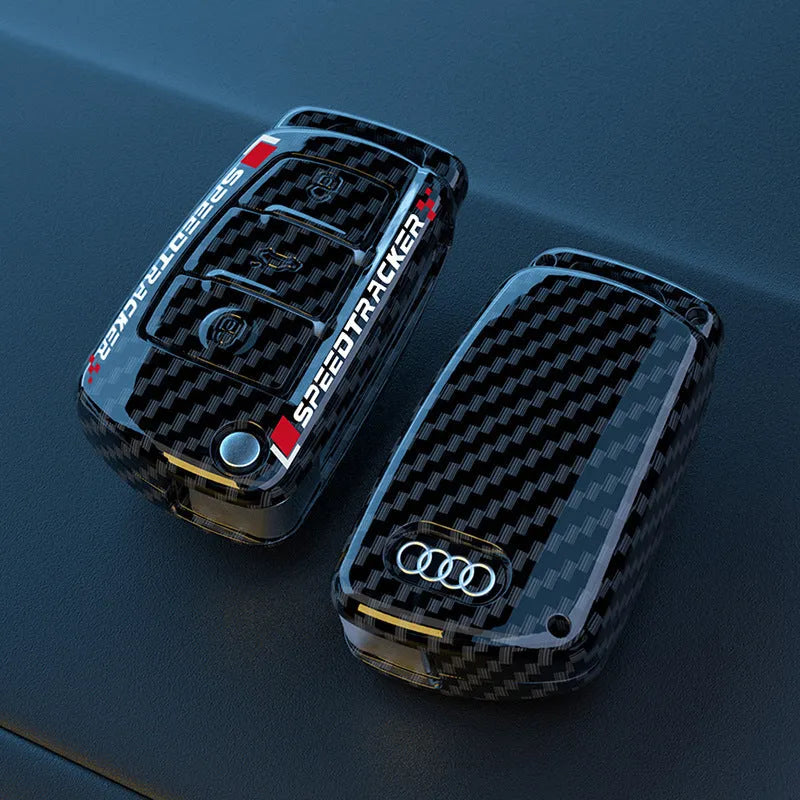 Carbon fibre style car key cover with mirror elements in carbon and white colour options