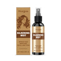 100ml bottle of hair care spray with ginger and rosemary extract
