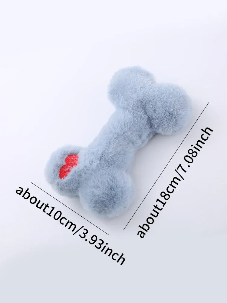 Blue love bone shaped plush dog toy with squeaker for biting and chewing.