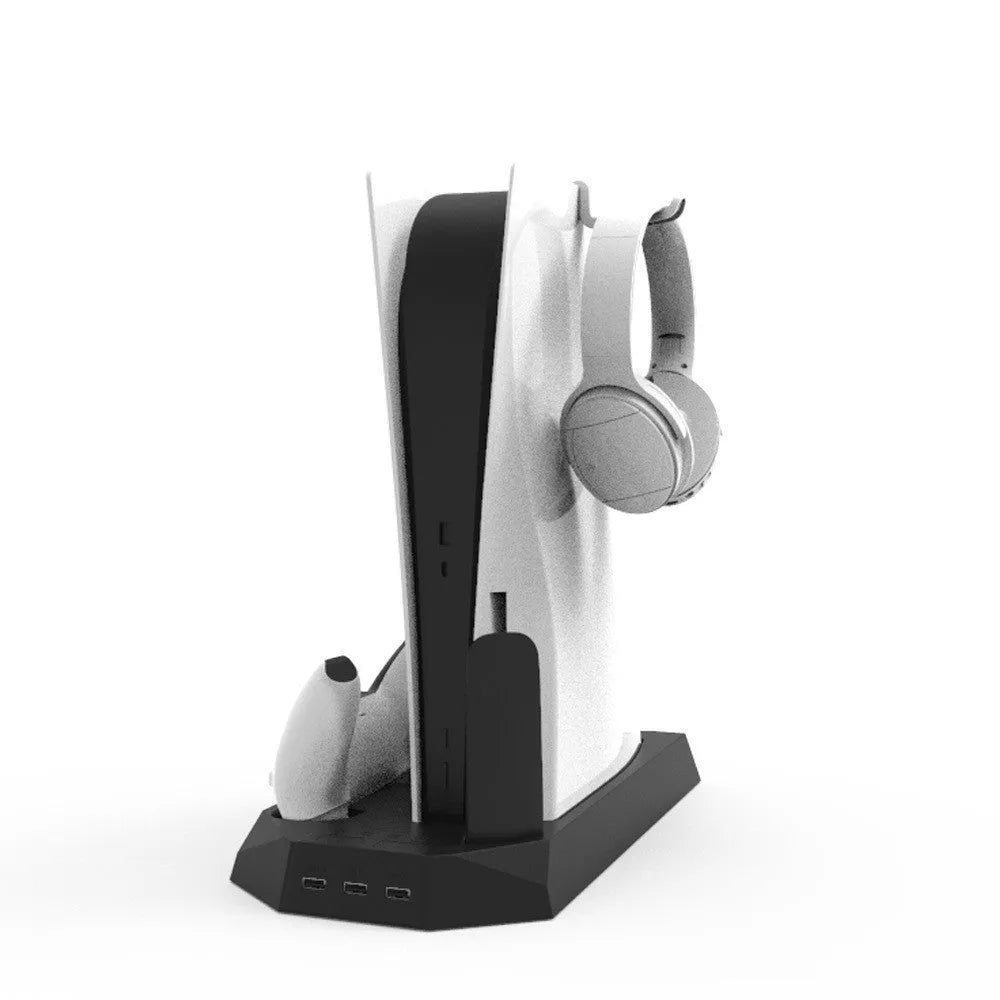 Black PS5 charging base radiator dock with a DualSense controller plugged in and a headset hanging on the hook.