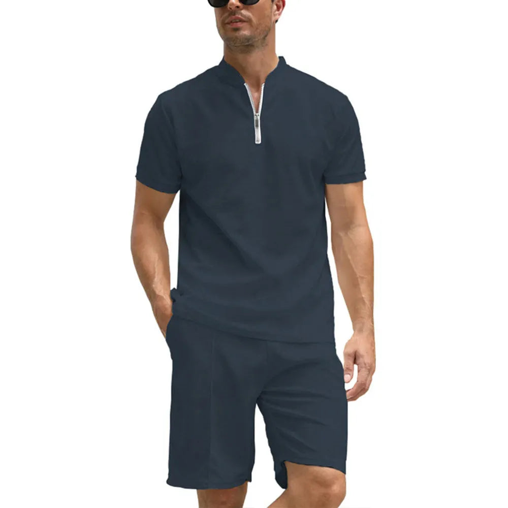 Men's solid colour short sleeve polo shirt and trousers two-piece set on a hanger.
